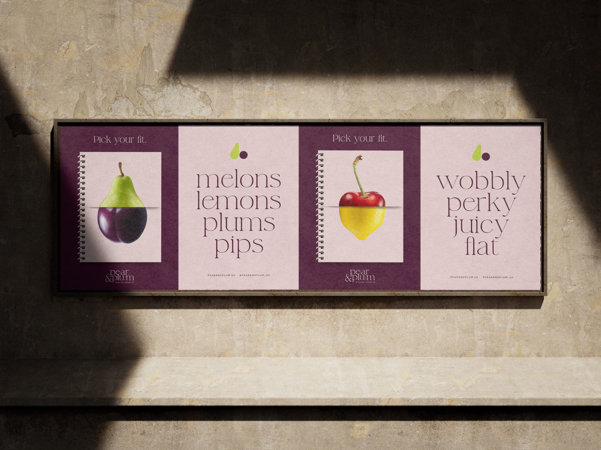 Four posters for Pear and Plum ad campaign framed on wall