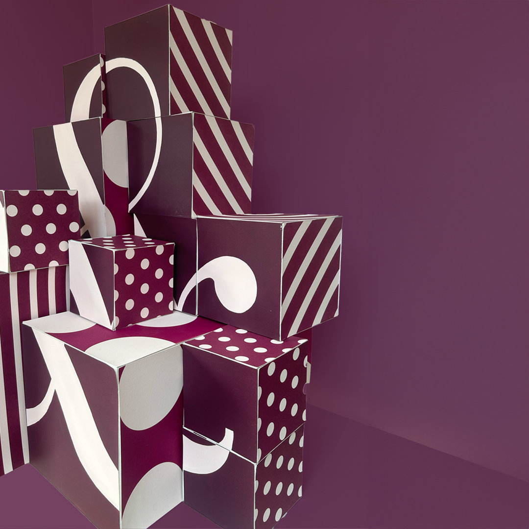 Purple boxes stacked to create ampersand