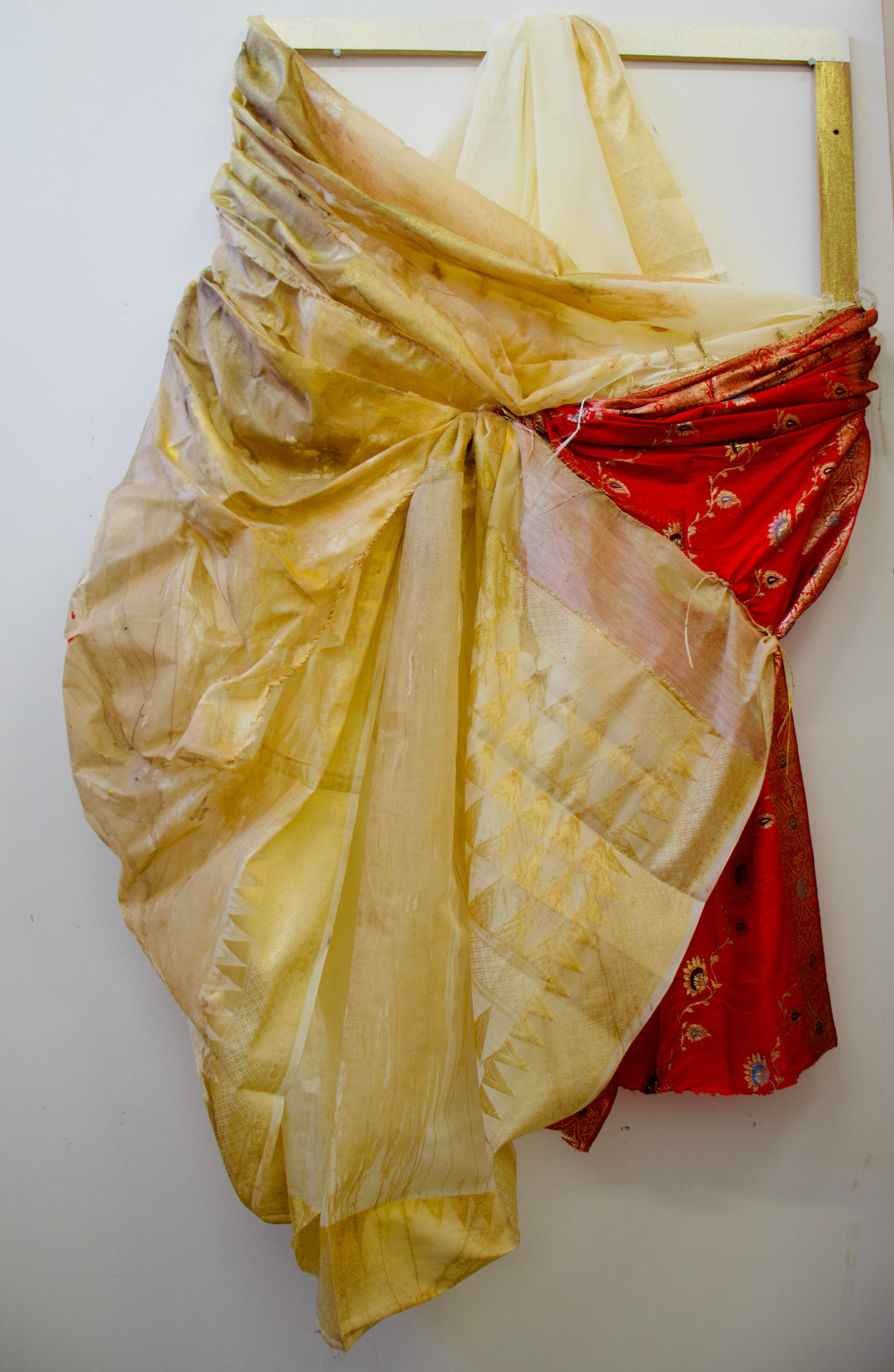 Red and gold indian garment