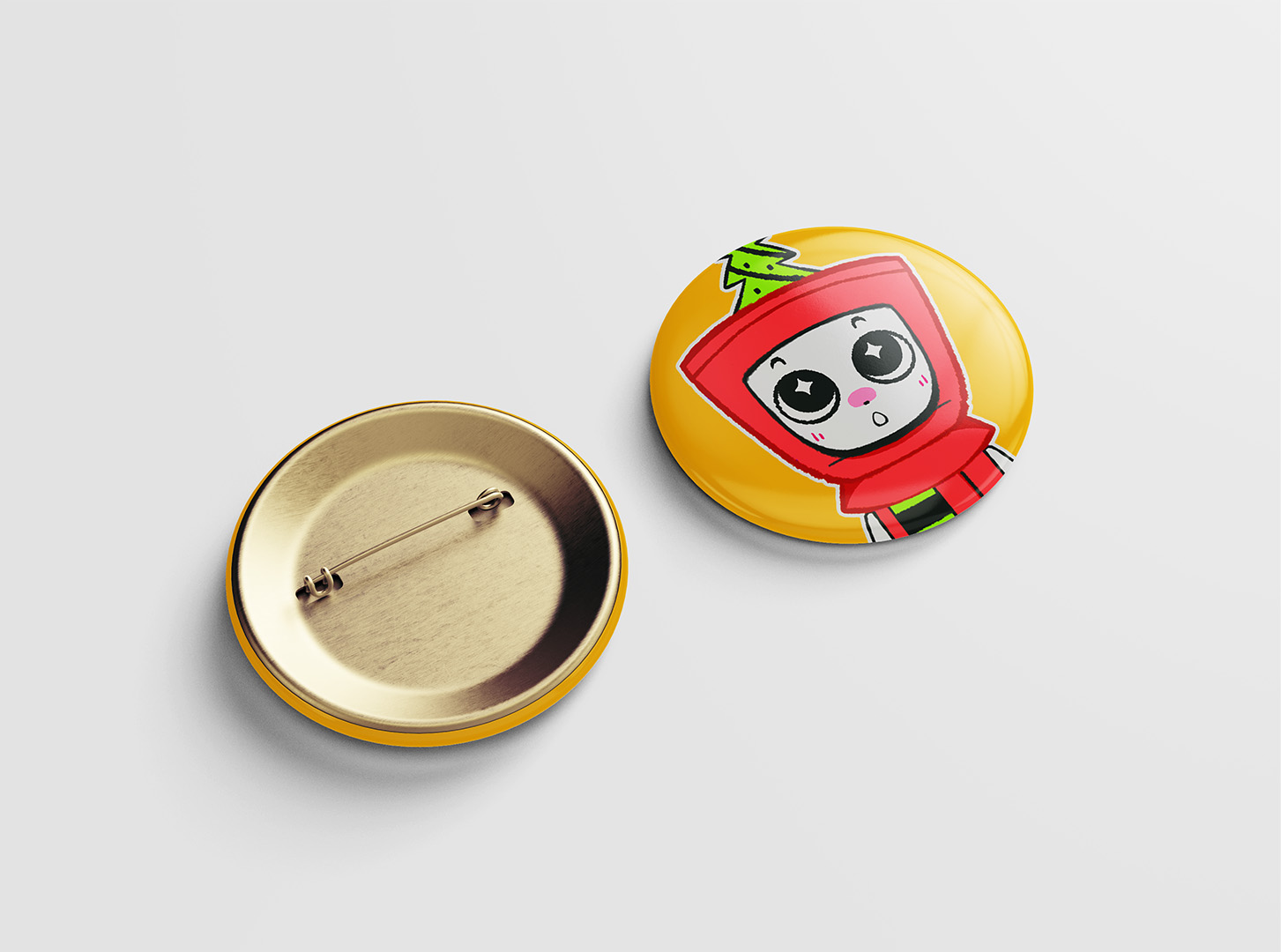 Two badges, one face down the other face up with Bambinoo character illustration