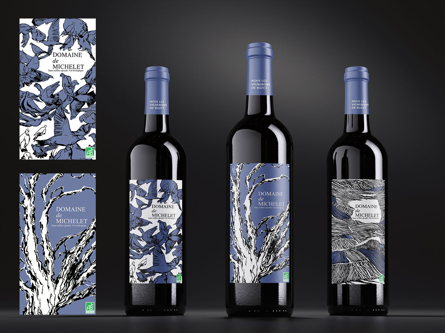 Three wine bottles with illustrated labels featuring birds, trees and vineyards
