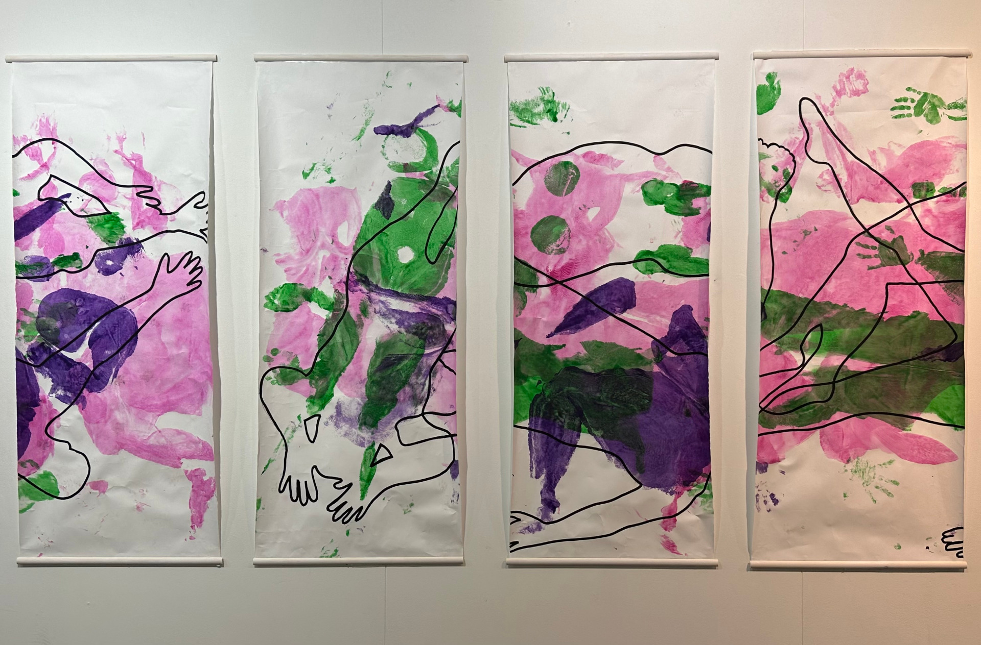 Artwork consisting of four canvases with body outlines and pink, green and purple paint