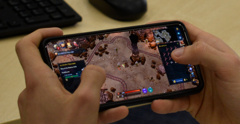 Smartphone showing screen from Runescape