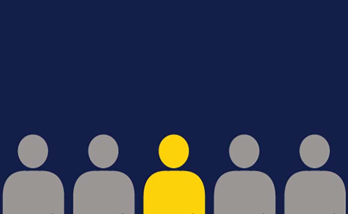 Graphic design showing four grey people and one yellow
