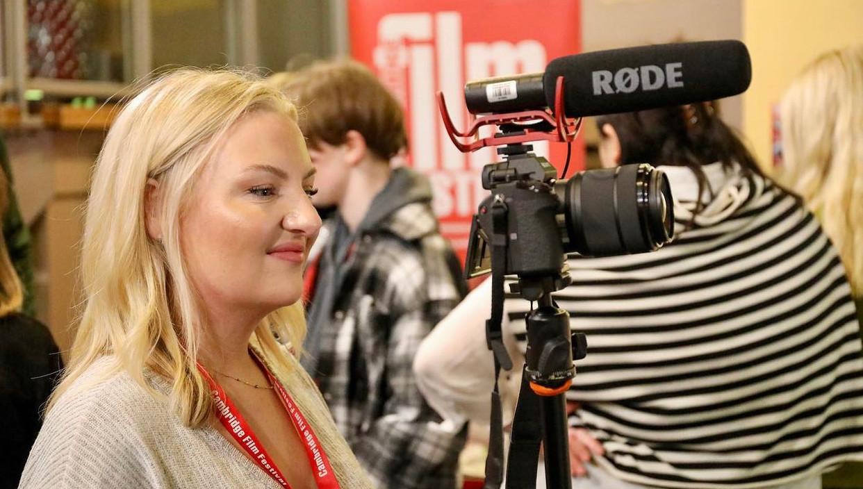 Megan operating camera at Cambridge Film Festival 2023