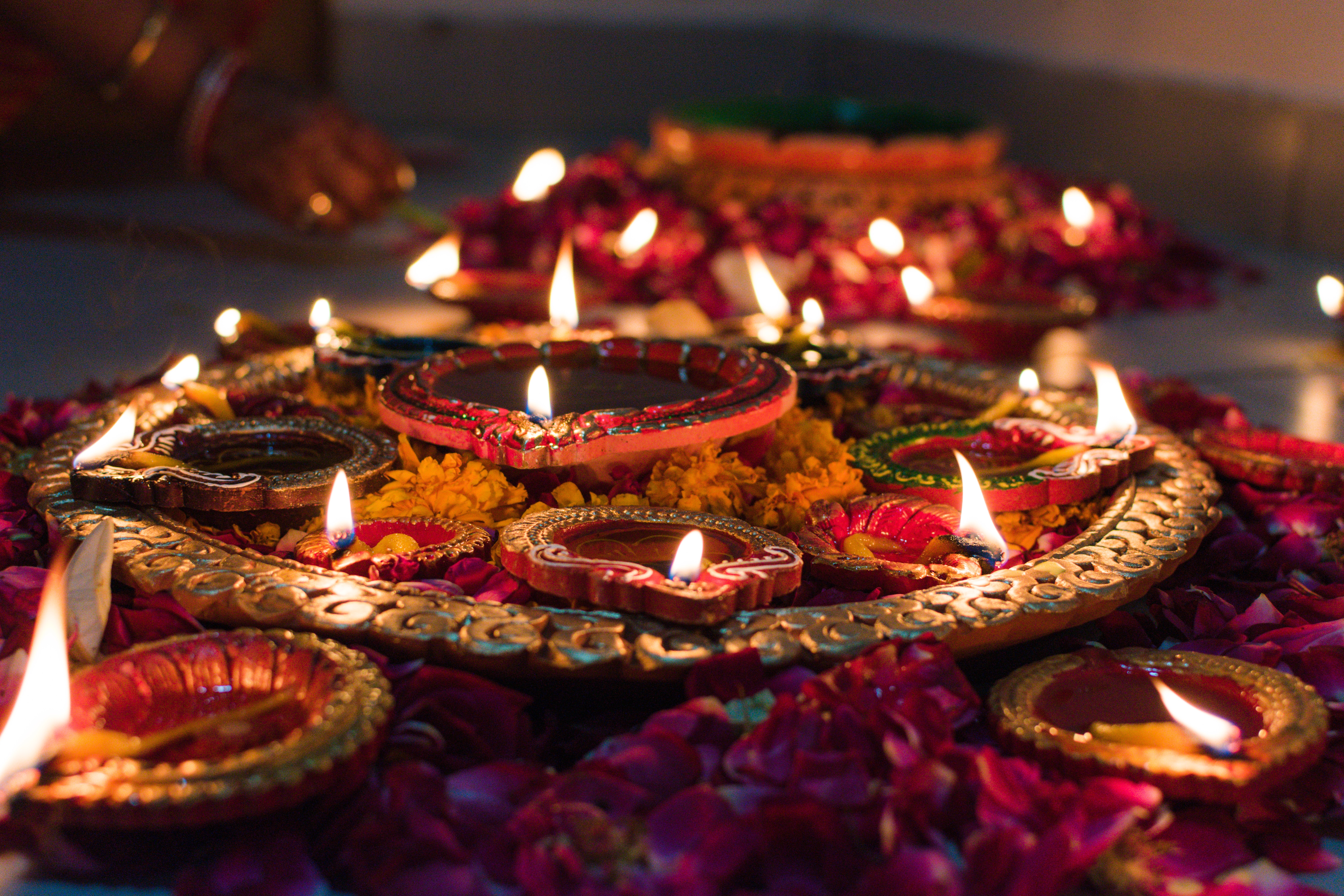 A photo of lit candles by Udayaditya Barua