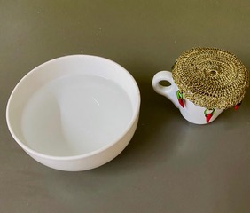 A photo of a bowl and a mug.