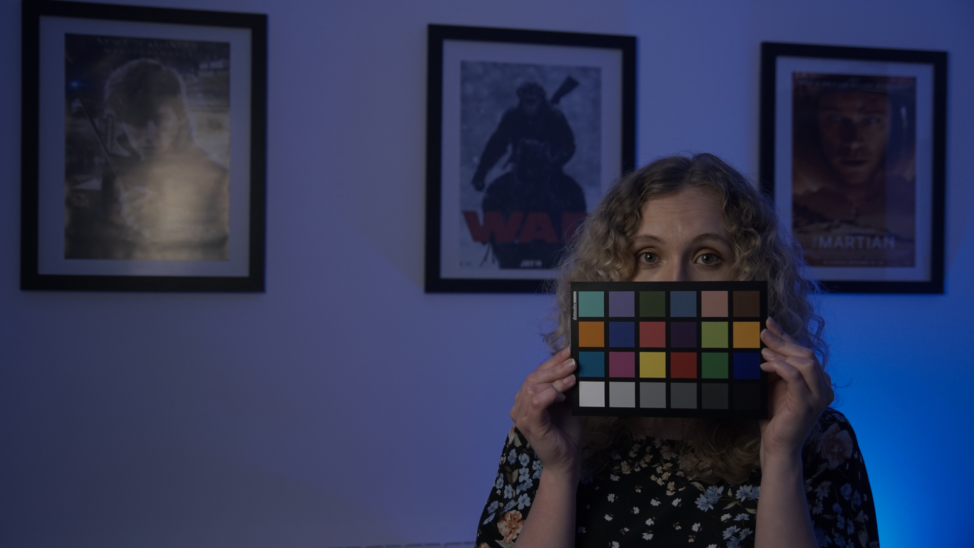Victoria Burrows holding up a colourboard