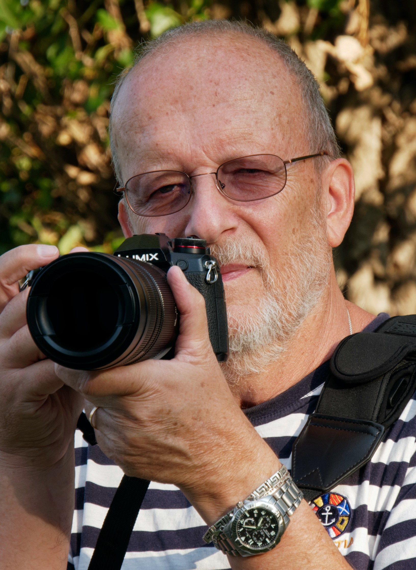 Professor György Szönyi with camera.