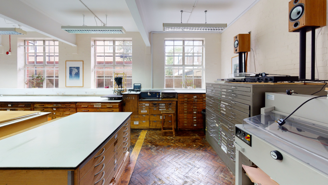 Cupboards and workspace in print room