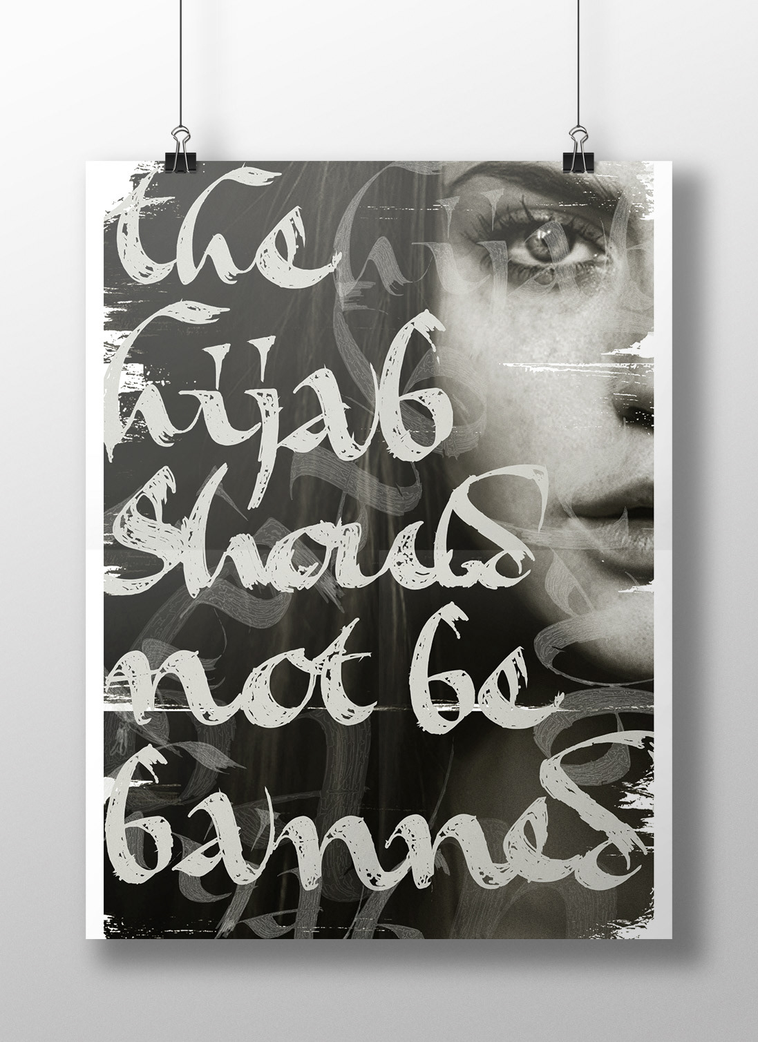 Poster of woman's face with the words 'the hijab should not be banned'