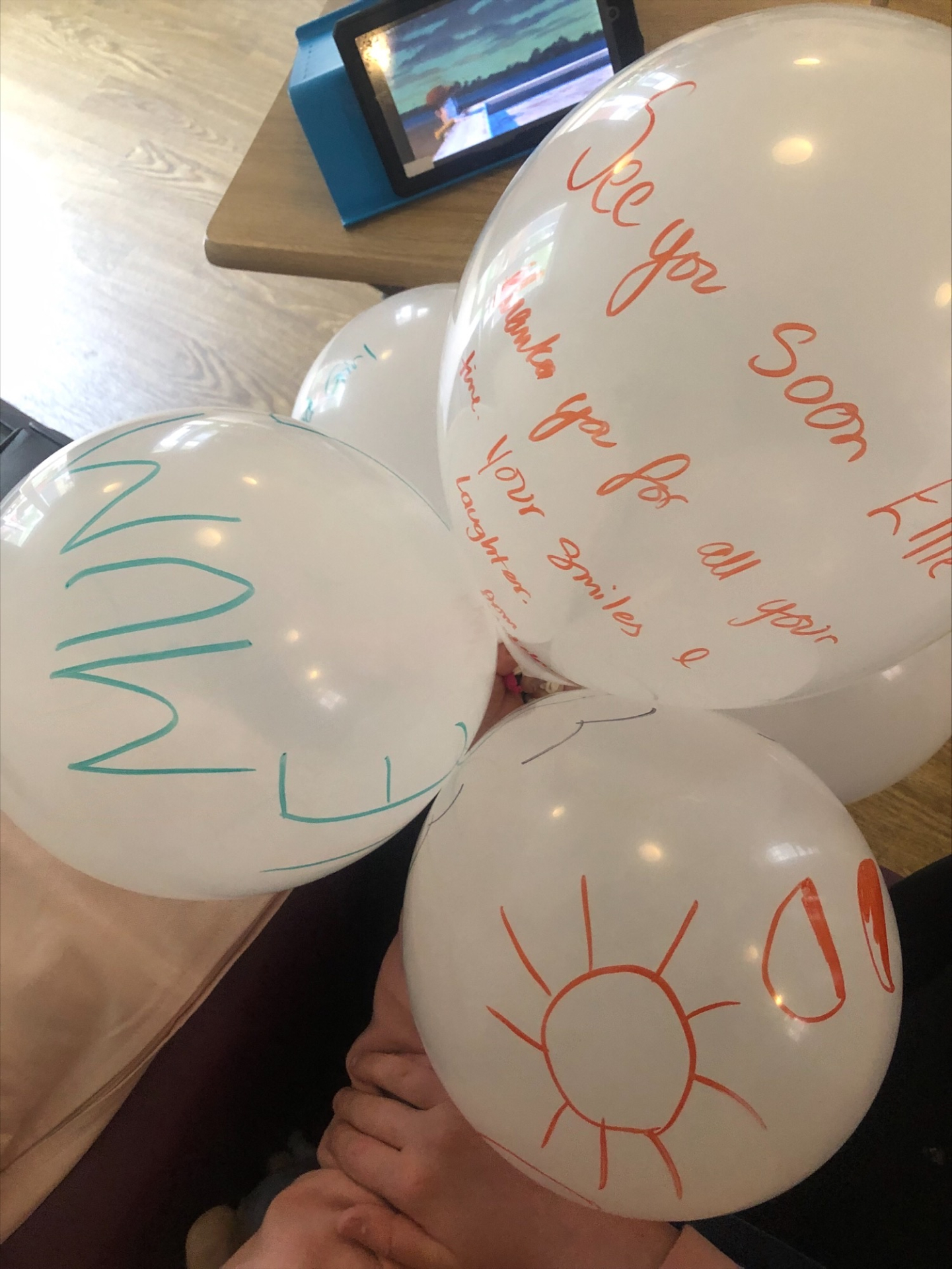 Balloons with thank you messages written on them